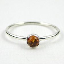 Warmth & Whimsy: Crafting Your Amber Sterling Silver Ring