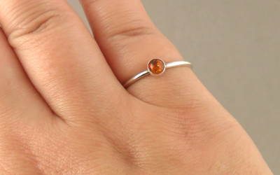 Behind the Glow: Your Amber Sterling Silver Stacking Ring Story