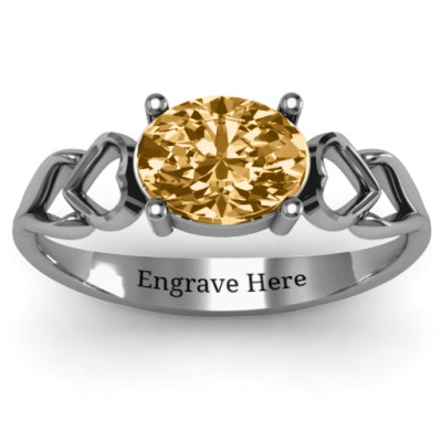 Oval Solitaire Ring with Surrounding Hearts