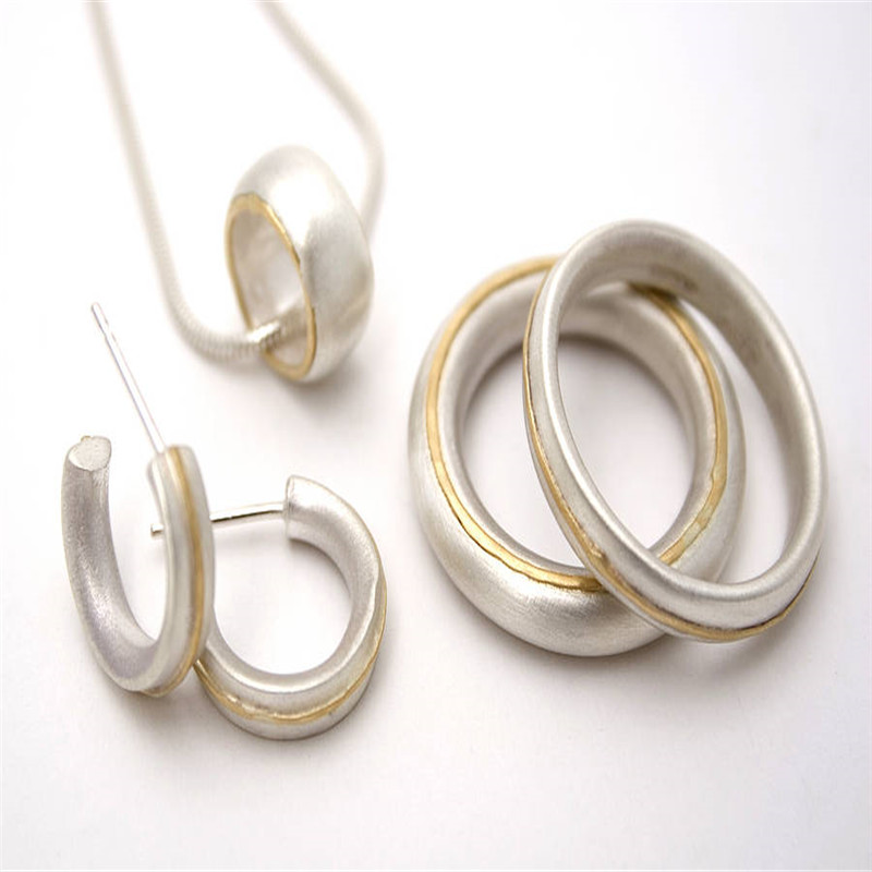 Thin Sterling Silver Ring With 18ct Yellow Gold Detail